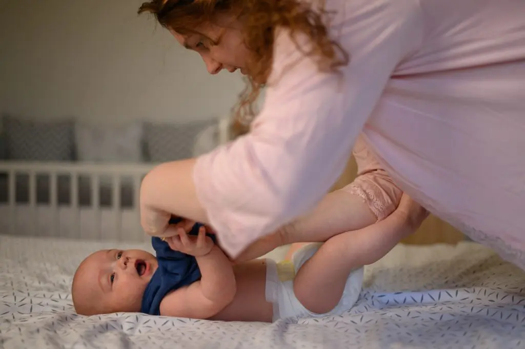 A nurse caring for a newborn overnight at home